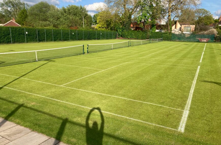 Pristine lawn tennis court surface